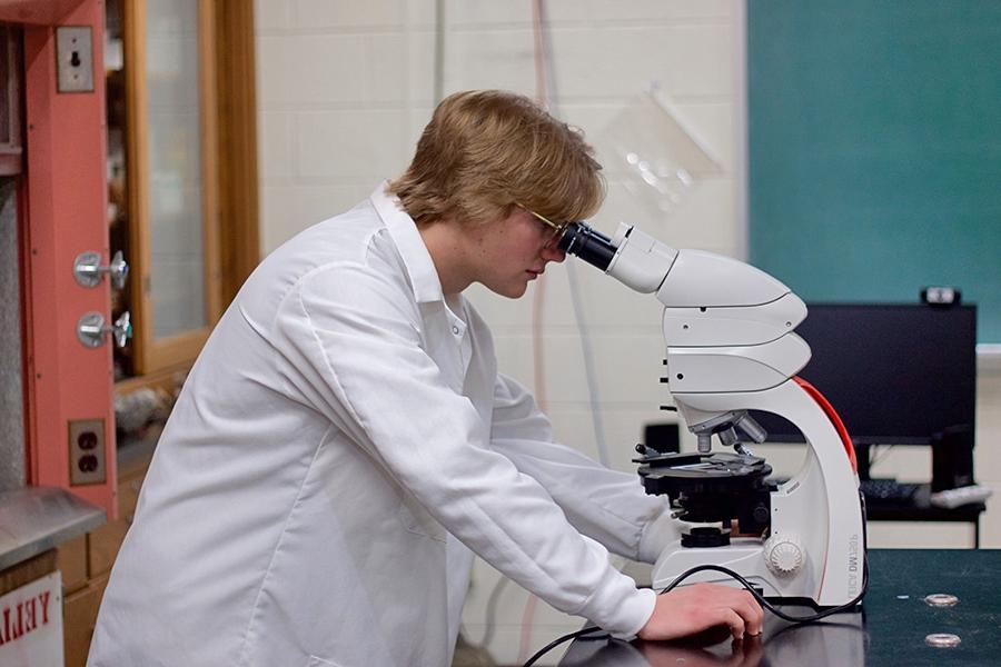 Chemistry degree Student Does Research In A Lab